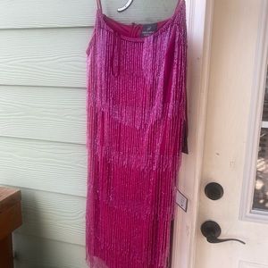 Brand new tags still on. Prefect Dress for any special event.